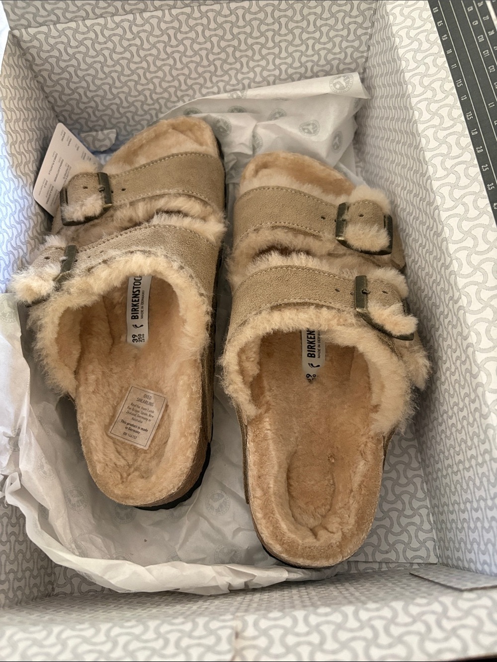 Birkenstock Shearling-Lined Double Buckle Sandals in Beige/Tan